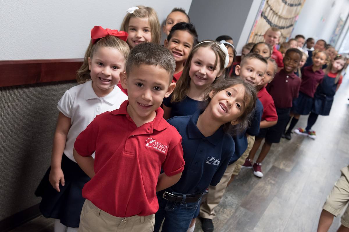 Students at Legacy Traditional Schools show off their uniforms