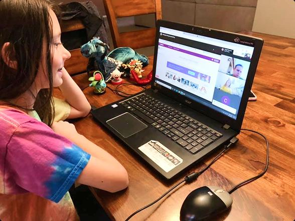 A student takes classes online as a part of the Legacy Online Academy